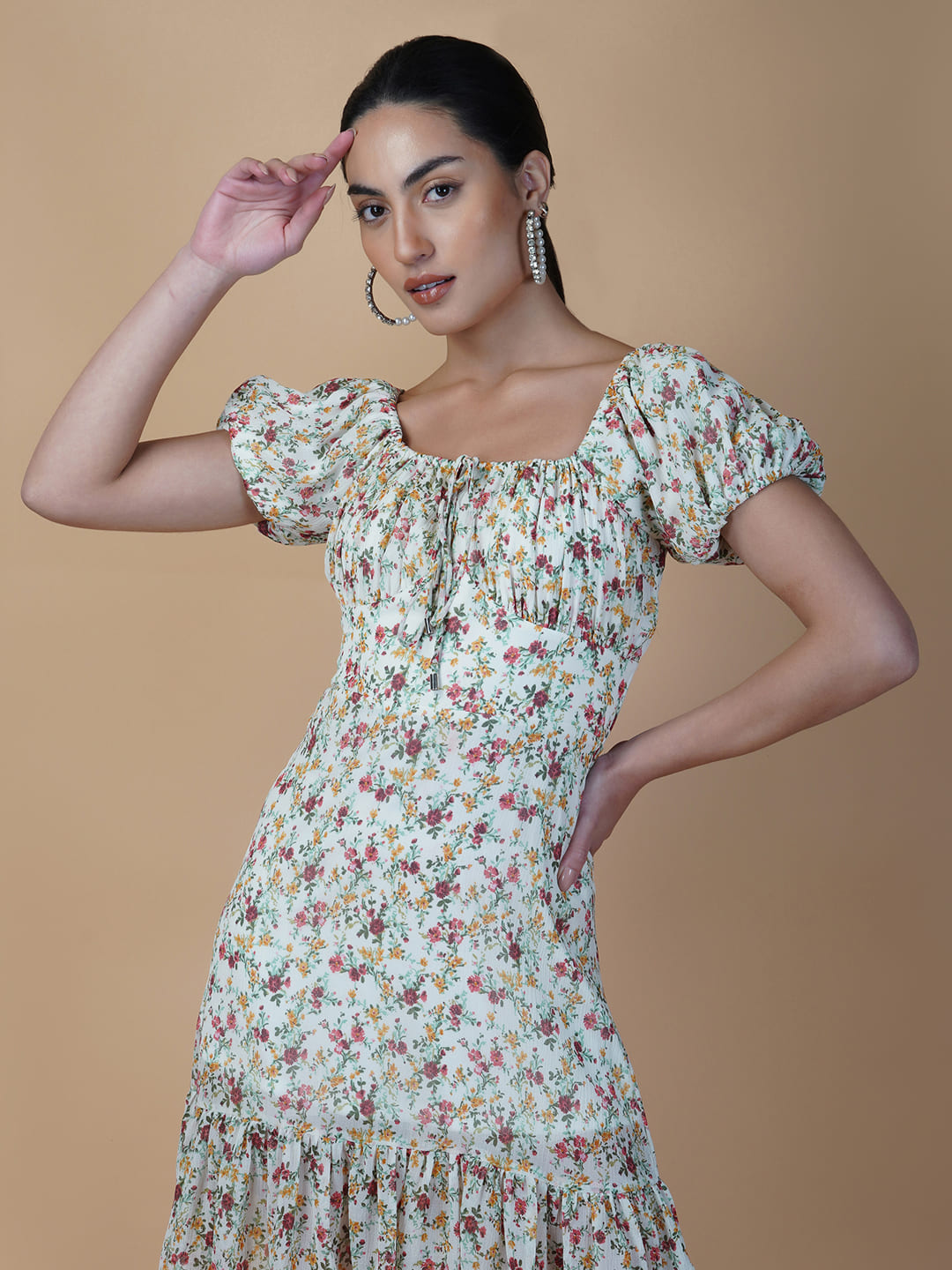 The Chiffon Printed Empire Waist Women Dress is a beautiful and elegant piece that is perfect for any special occasion. The dress features a flattering empire waist design, which accentuates the natural curves of the body, while the ruched bust adds a touch of femininity.