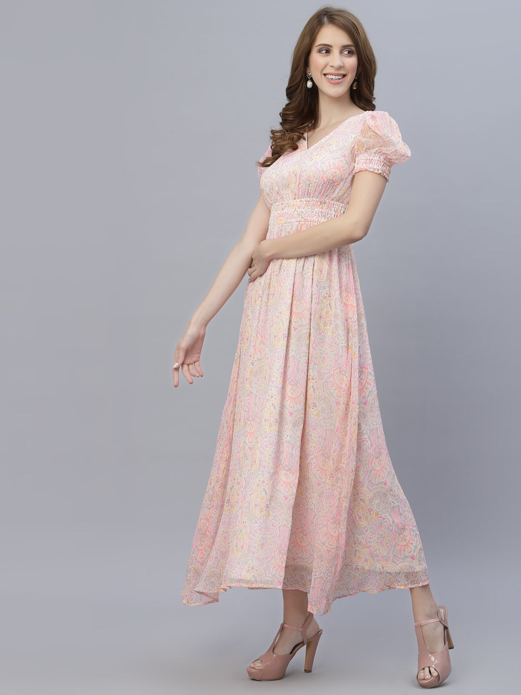 The chiffon maxi dress with a clinched waist and attached lining is a perfect choice for a formal or semi-formal event. The chiffon fabric gives the dress a flowing, elegant look, while the clinched waist adds definition and shape to the body.