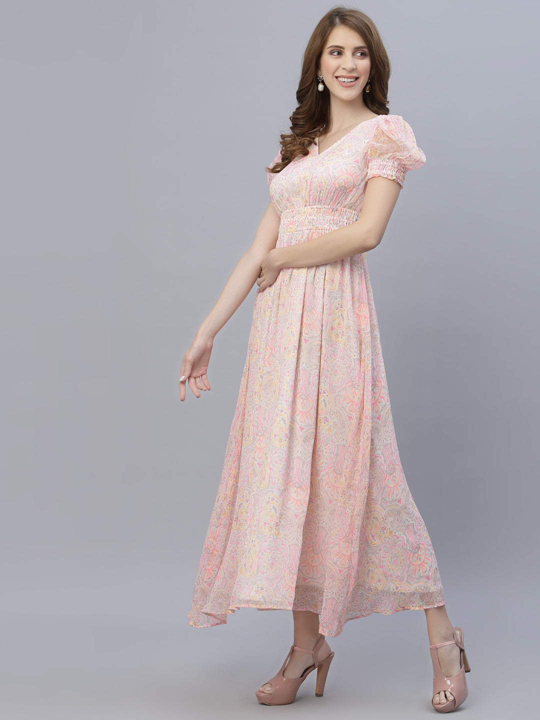 The chiffon maxi dress with a clinched waist and attached lining is a perfect choice for a formal or semi-formal event. The chiffon fabric gives the dress a flowing, elegant look, while the clinched waist adds definition and shape to the body.