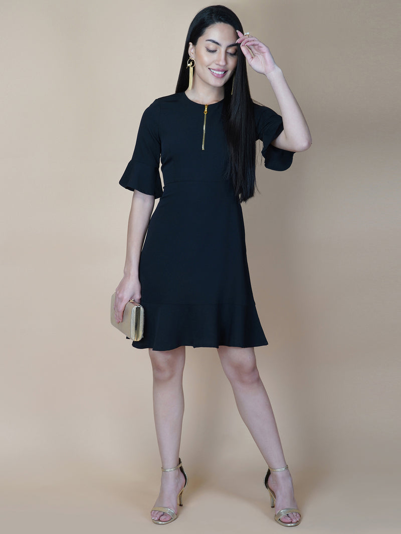 Amp up your summer style with this solid A line dress. Slip into this black short dress for an effortlessly elegant day-out ensemble. Tailored with metallic zip  and circular hem, the dress comes with a side concealed zipper for making it easy to wear .  This dress is perfect for your casual as well formal day out.  Style Tip: Complete the look with hanging earrings and a clutch