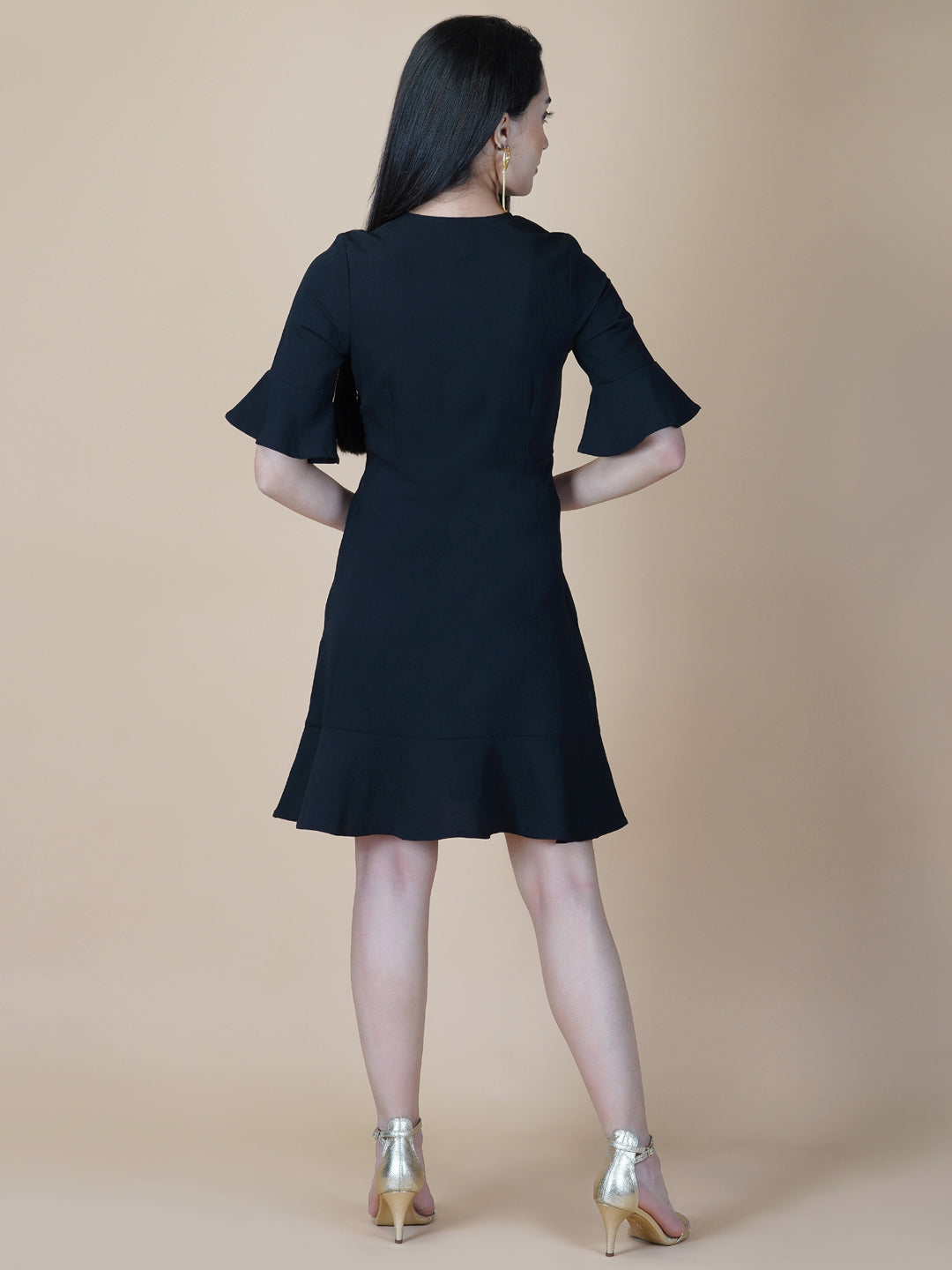 Amp up your summer style with this solid A line dress. Slip into this black short dress for an effortlessly elegant day-out ensemble. Tailored with metallic zip  and circular hem, the dress comes with a side concealed zipper for making it easy to wear .  This dress is perfect for your casual as well formal day out.  Style Tip: Complete the look with hanging earrings and a clutch