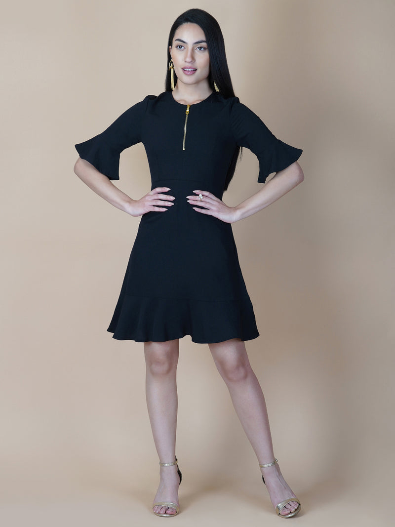 Amp up your summer style with this solid A line dress. Slip into this black short dress for an effortlessly elegant day-out ensemble. Tailored with metallic zip  and circular hem, the dress comes with a side concealed zipper for making it easy to wear .  This dress is perfect for your casual as well formal day out.  Style Tip: Complete the look with hanging earrings and a clutch