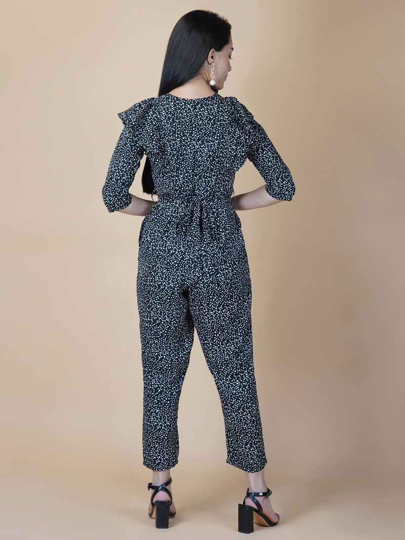 This black and white printed women jumpsuit is perfect for a stylish and chic look. The bow tie belt adds a touch of femininity, while the side ruffles add a playful element. It's made from a soft and lightweight material that's perfect for wearing all day long.
