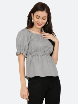 A grey gingham ruched waist women's top with gathered sleeves is a stylish and feminine garment. The top features a classic grey gingham pattern, with a fitted waistline that is gathered and ruched for a flattering silhouette. The gathered sleeves add a touch of volume and interest to the design.
