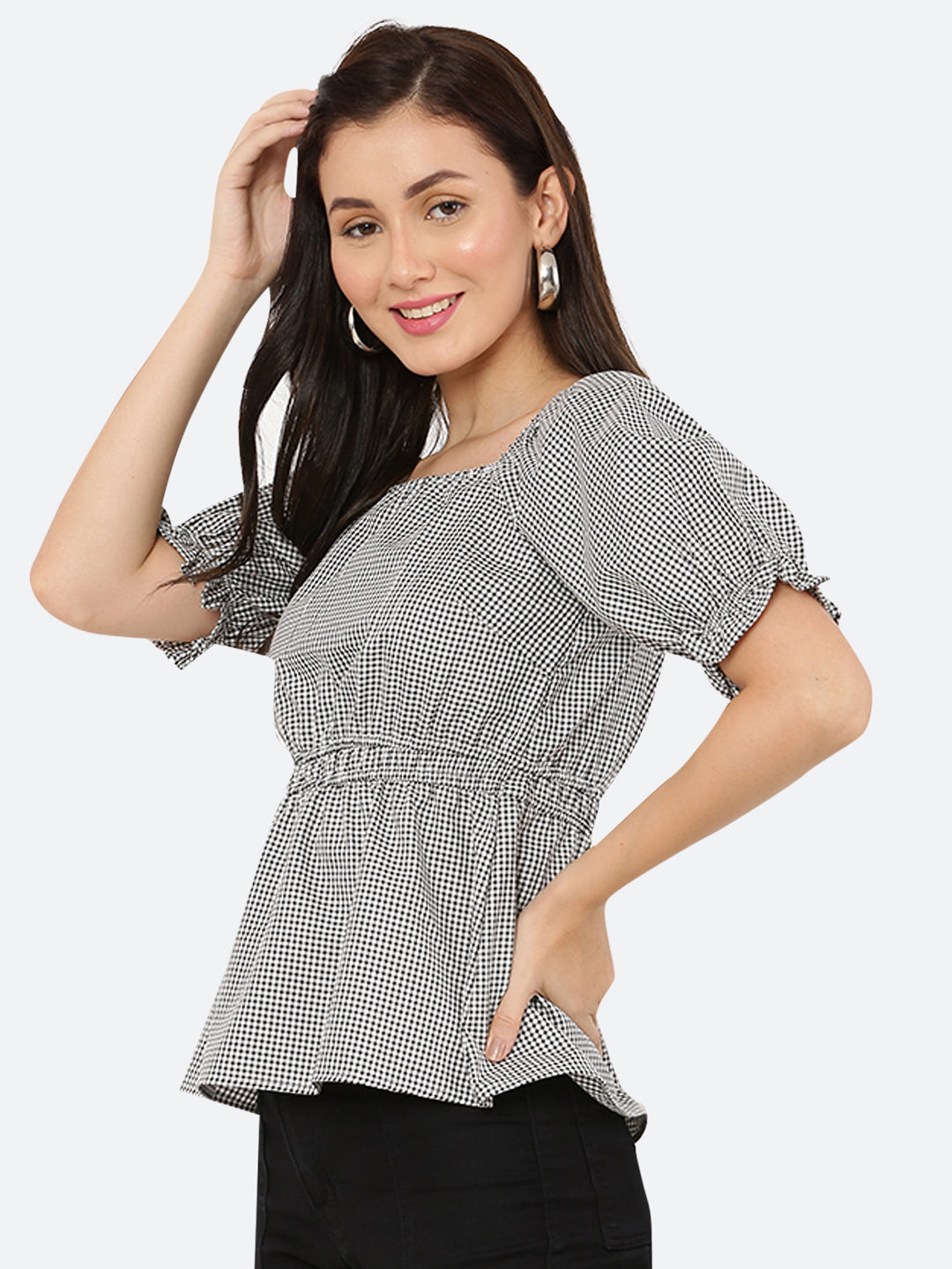 A grey gingham ruched waist women's top with gathered sleeves is a stylish and feminine garment. The top features a classic grey gingham pattern, with a fitted waistline that is gathered and ruched for a flattering silhouette. The gathered sleeves add a touch of volume and interest to the design.