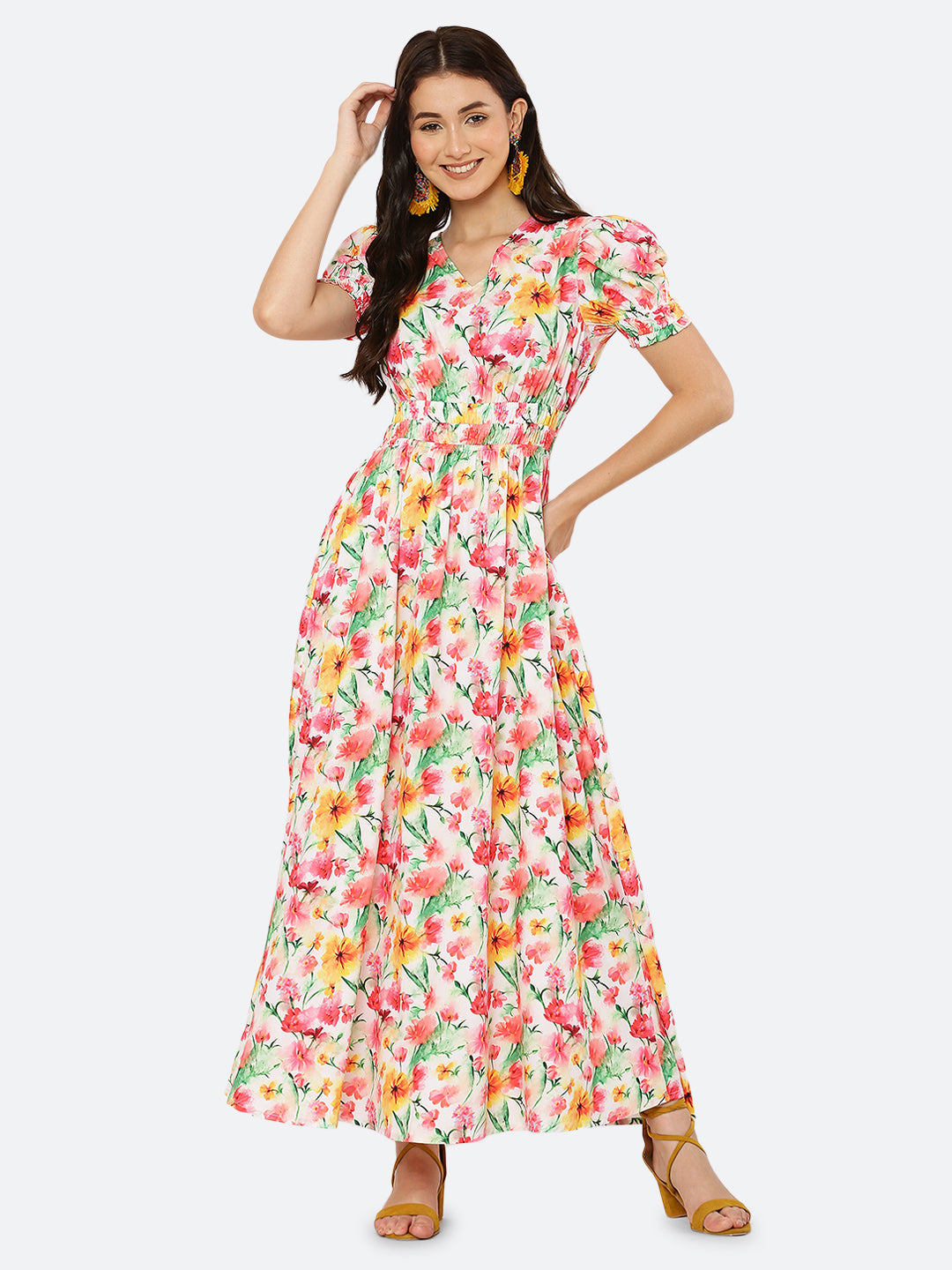 This  maxi dress features a bold print that adds a touch of sophistication to the silhouette. The rouched waist and sleeves create a flattering and feminine shape, while the attached lining provides comfort and coverage. Perfect for both formal and casual occasions, this dress can be styled with statement earrings, strappy heels, and a clutch for a chic and effortless look.