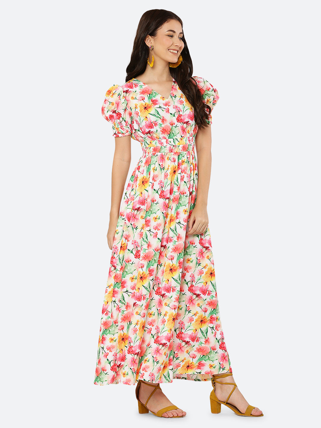 This  maxi dress features a bold print that adds a touch of sophistication to the silhouette. The rouched waist and sleeves create a flattering and feminine shape, while the attached lining provides comfort and coverage. Perfect for both formal and casual occasions, this dress can be styled with statement earrings, strappy heels, and a clutch for a chic and effortless look.