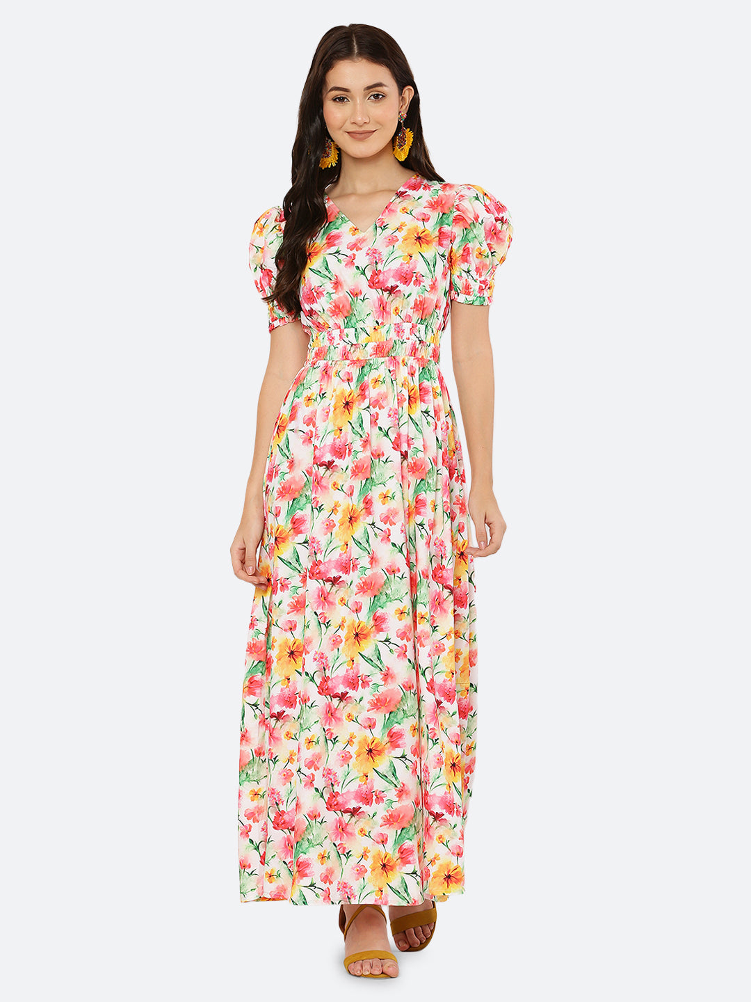 This  maxi dress features a bold print that adds a touch of sophistication to the silhouette. The rouched waist and sleeves create a flattering and feminine shape, while the attached lining provides comfort and coverage. Perfect for both formal and casual occasions, this dress can be styled with statement earrings, strappy heels, and a clutch for a chic and effortless look.