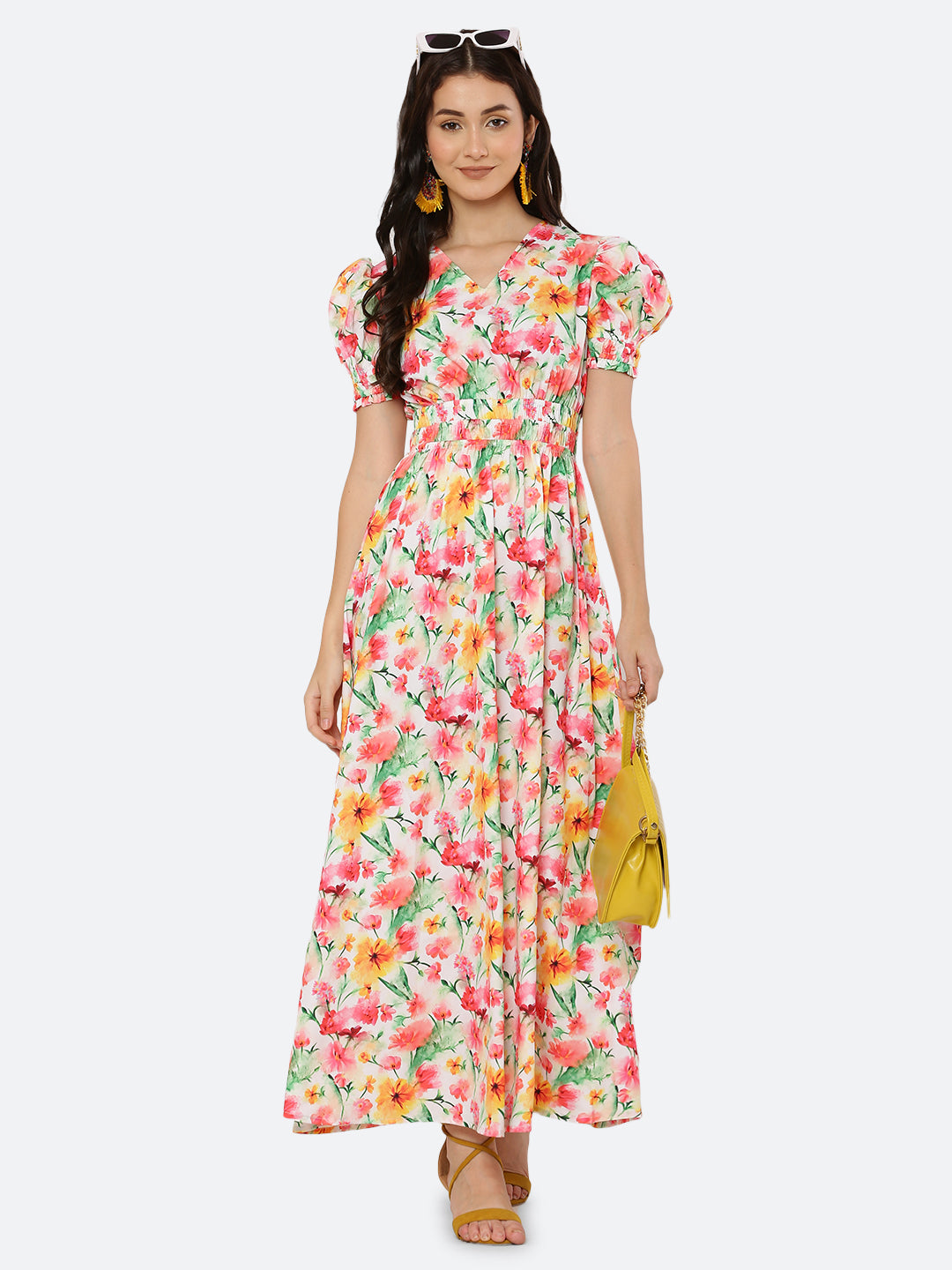 This  maxi dress features a bold print that adds a touch of sophistication to the silhouette. The rouched waist and sleeves create a flattering and feminine shape, while the attached lining provides comfort and coverage. Perfect for both formal and casual occasions, this dress can be styled with statement earrings, strappy heels, and a clutch for a chic and effortless look.