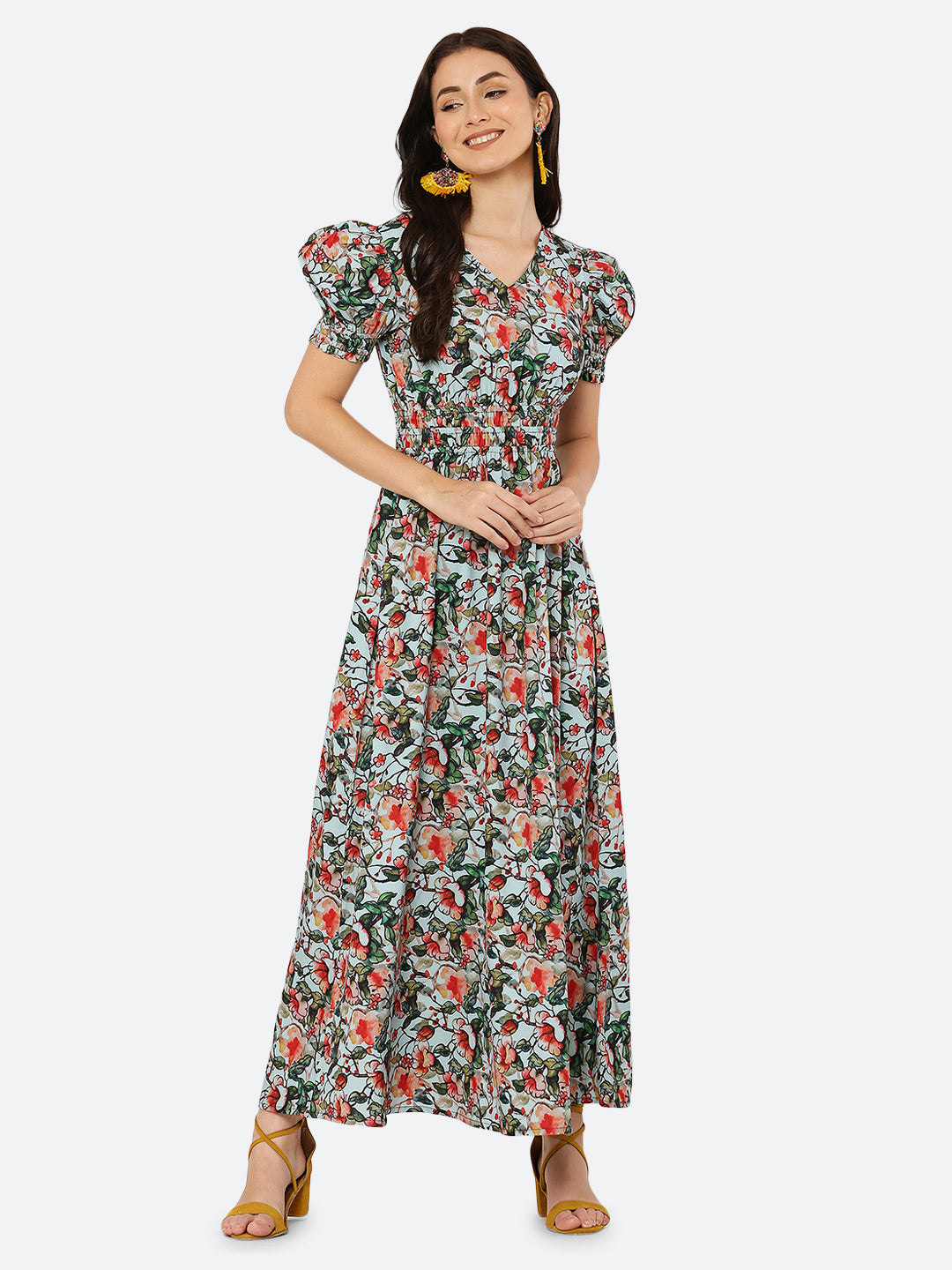 This  maxi dress features a bold print that adds a touch of sophistication to the silhouette. The rouched waist and sleeves create a flattering and feminine shape, while the attached lining provides comfort and coverage. Perfect for both formal and casual occasions, this dress can be styled with statement earrings, strappy heels, and a clutch for a chic and effortless look.