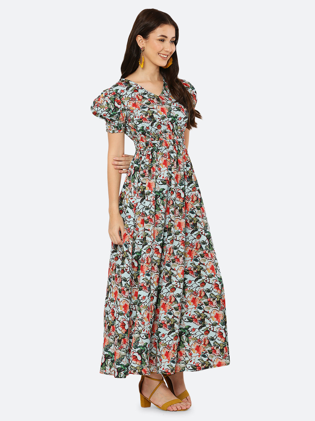 This  maxi dress features a bold print that adds a touch of sophistication to the silhouette. The rouched waist and sleeves create a flattering and feminine shape, while the attached lining provides comfort and coverage. Perfect for both formal and casual occasions, this dress can be styled with statement earrings, strappy heels, and a clutch for a chic and effortless look.