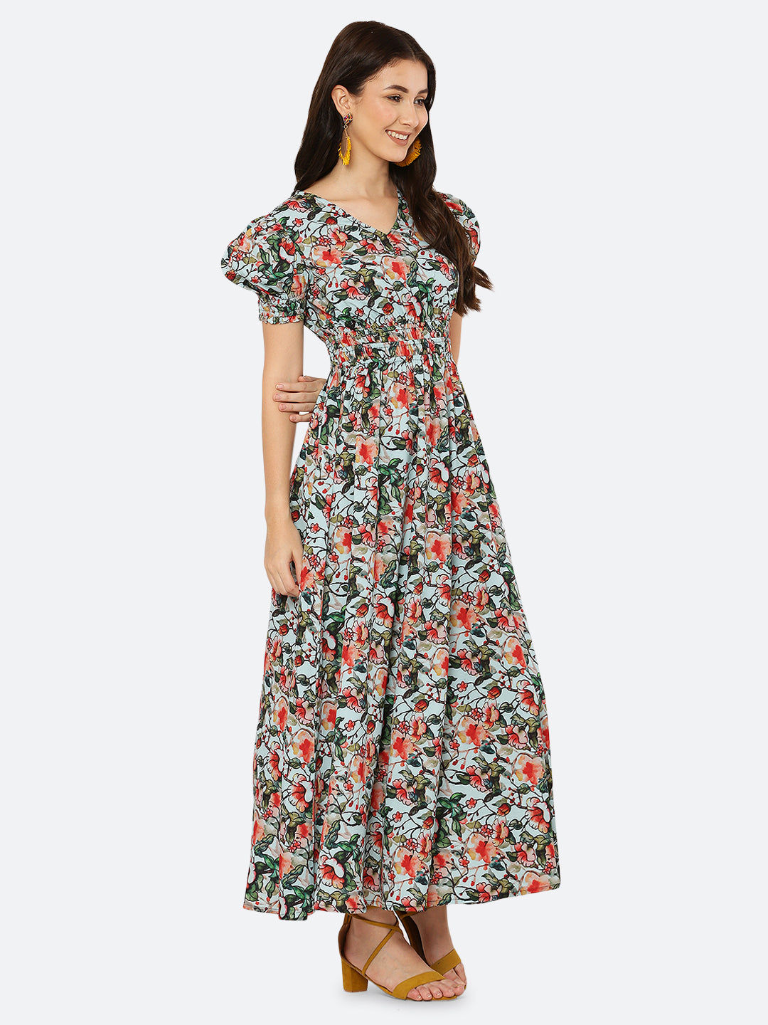 This  maxi dress features a bold print that adds a touch of sophistication to the silhouette. The rouched waist and sleeves create a flattering and feminine shape, while the attached lining provides comfort and coverage. Perfect for both formal and casual occasions, this dress can be styled with statement earrings, strappy heels, and a clutch for a chic and effortless look.