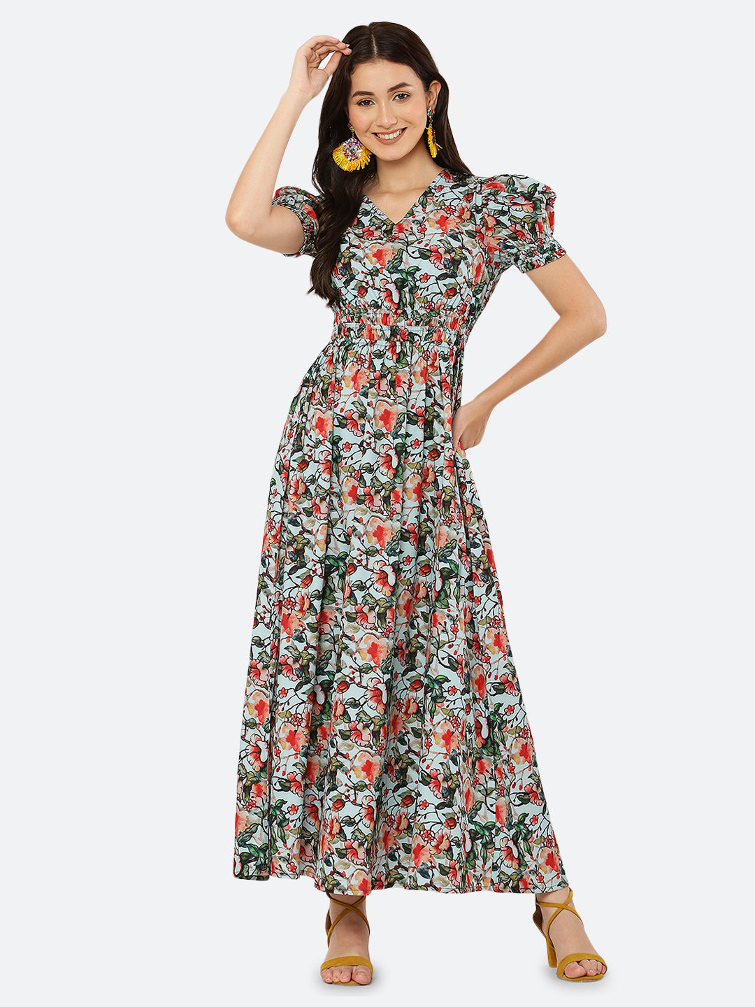 This  maxi dress features a bold print that adds a touch of sophistication to the silhouette. The rouched waist and sleeves create a flattering and feminine shape, while the attached lining provides comfort and coverage. Perfect for both formal and casual occasions, this dress can be styled with statement earrings, strappy heels, and a clutch for a chic and effortless look.