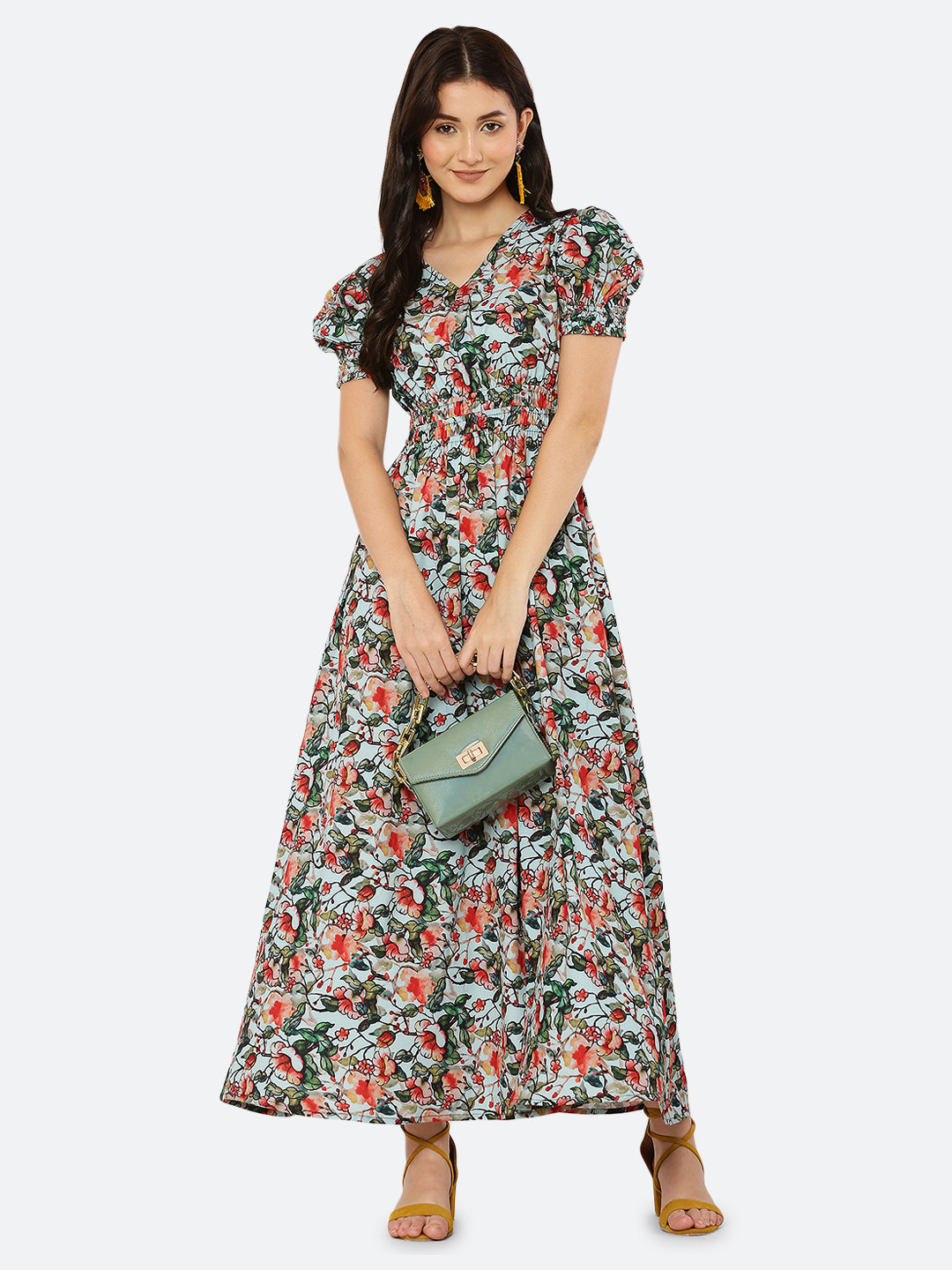 This  maxi dress features a bold print that adds a touch of sophistication to the silhouette. The rouched waist and sleeves create a flattering and feminine shape, while the attached lining provides comfort and coverage. Perfect for both formal and casual occasions, this dress can be styled with statement earrings, strappy heels, and a clutch for a chic and effortless look.