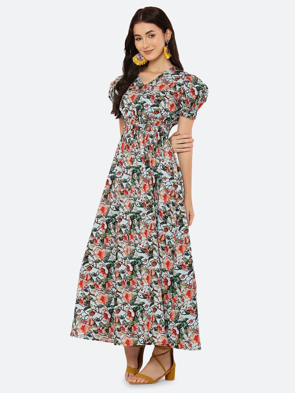 This  maxi dress features a bold print that adds a touch of sophistication to the silhouette. The rouched waist and sleeves create a flattering and feminine shape, while the attached lining provides comfort and coverage. Perfect for both formal and casual occasions, this dress can be styled with statement earrings, strappy heels, and a clutch for a chic and effortless look.
