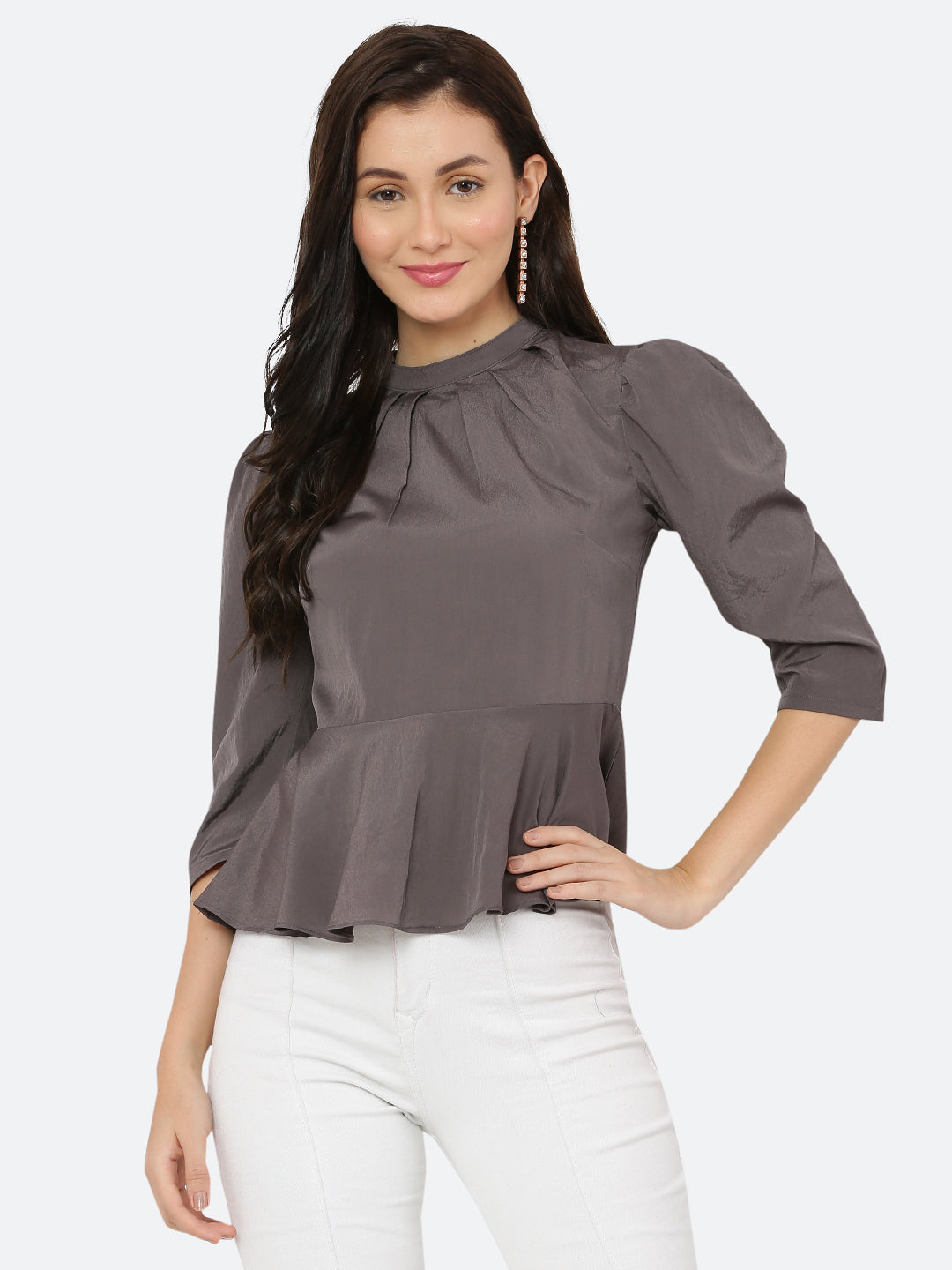 A grey colored women's top with a pleated neck and band collar is a stylish and sophisticated garment that can be worn for both casual and formal occasions. The pleated neck and band collar add a touch of elegance to the top, while the grey color gives it a classic and timeless look.