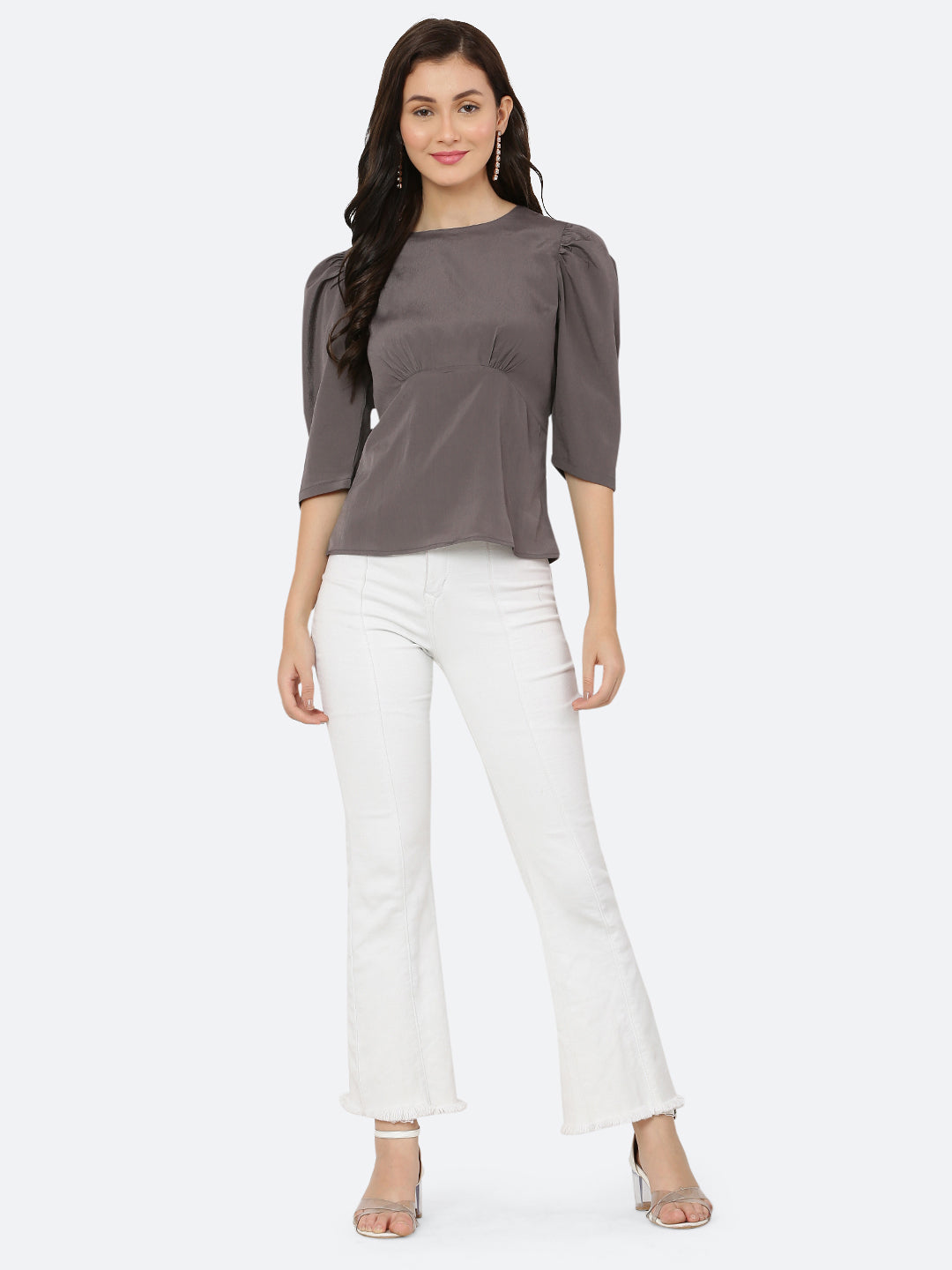 A ruched waist women's top typically features gathering or pleating at the waistline, which creates a snug and flattering fit. The top may be made from a variety of fabrics and come in different colors, but the grey color is a popular choice.