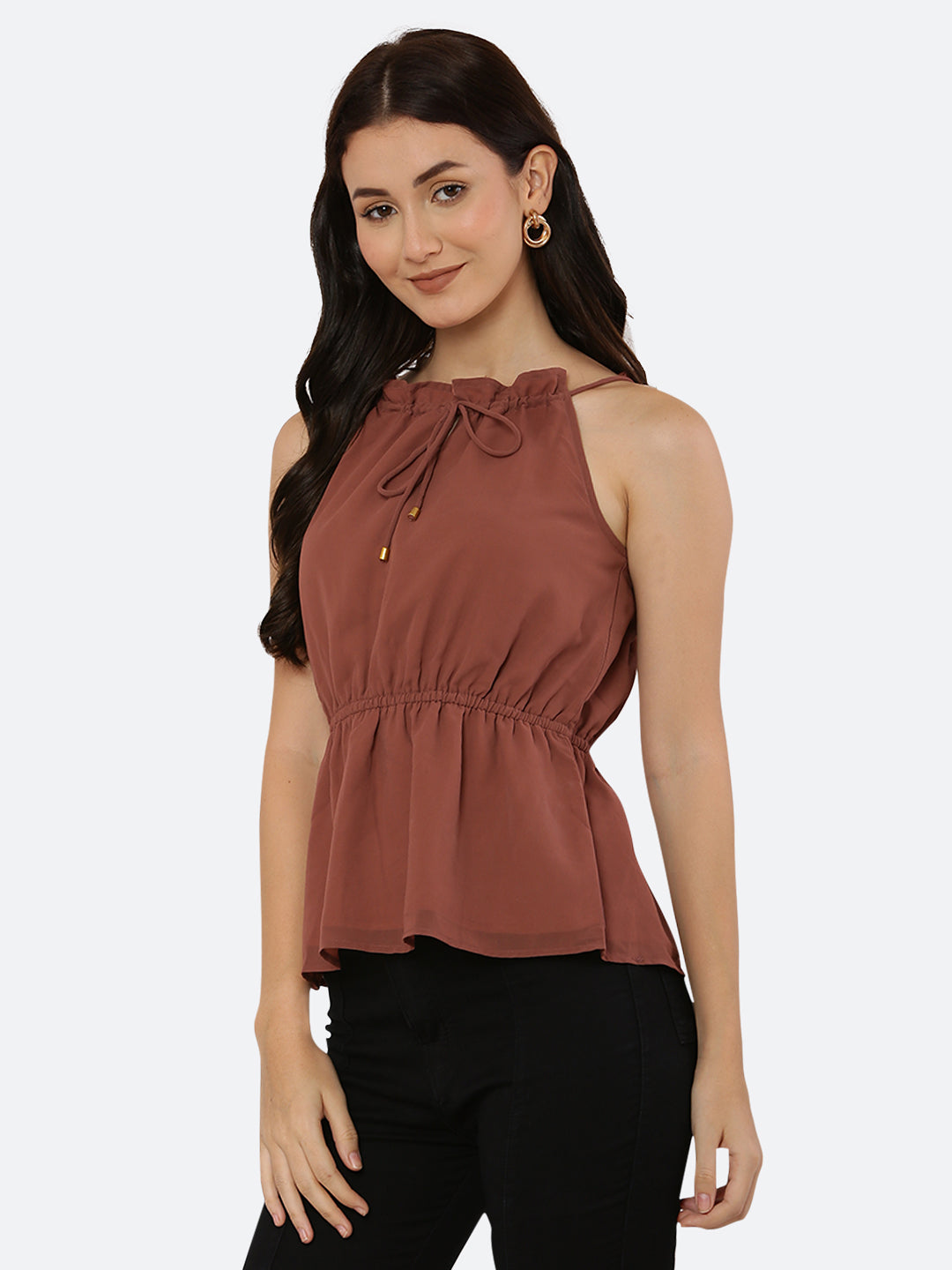 A Solid Brown Color Halter Neckline Top with drawstring and ruched waist is a stylish and versatile piece of clothing that can be dressed up or down depending on the occasion. The halter neckline creates an elegant and feminine look, while the drawstring and ruched waist add a touch of detail and texture to the top.