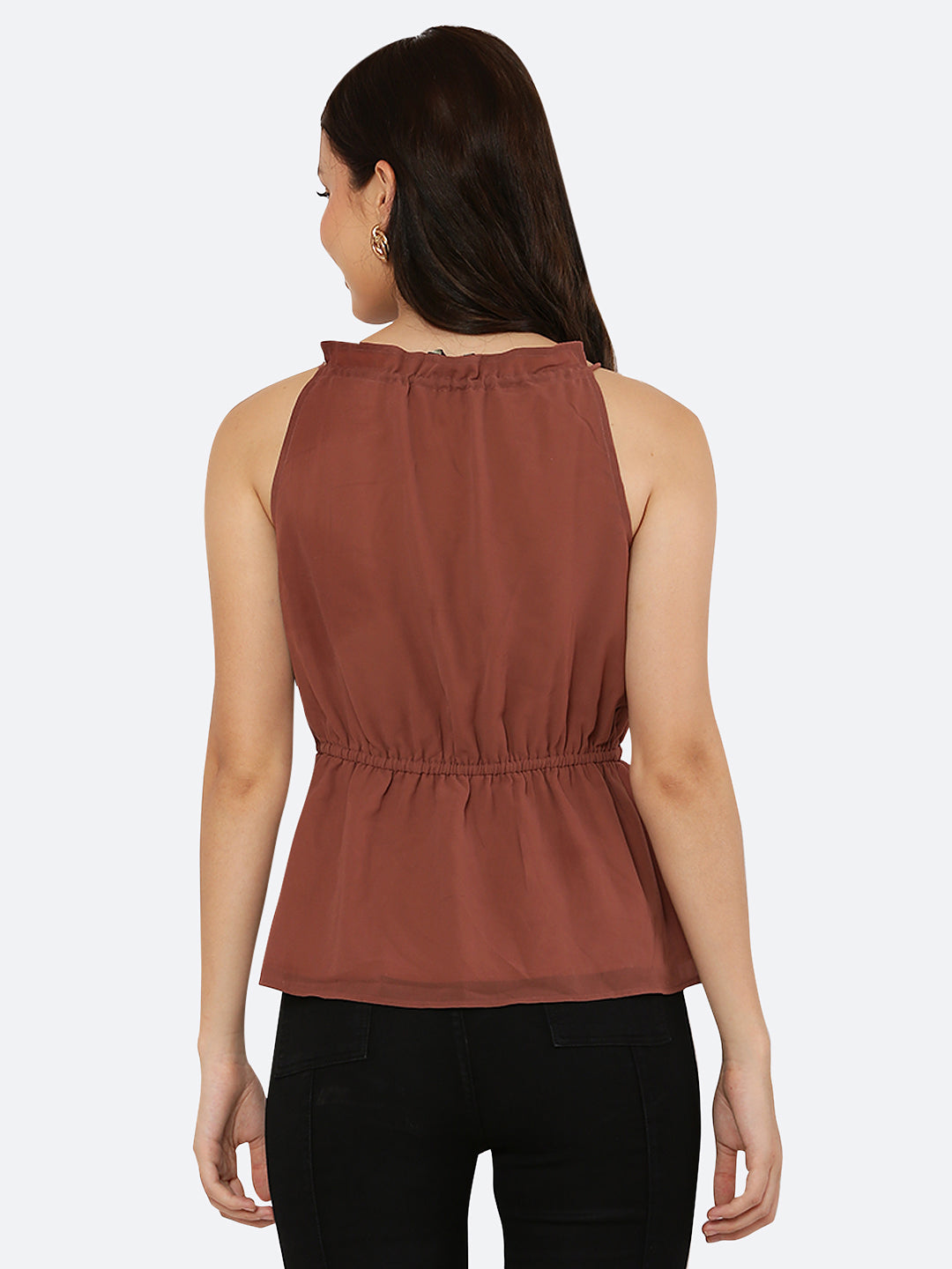 A Solid Brown Color Halter Neckline Top with drawstring and ruched waist is a stylish and versatile piece of clothing that can be dressed up or down depending on the occasion. The halter neckline creates an elegant and feminine look, while the drawstring and ruched waist add a touch of detail and texture to the top.