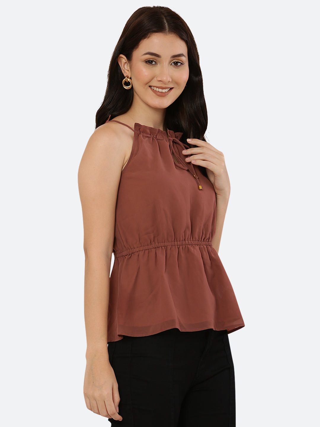 A Solid Brown Color Halter Neckline Top with drawstring and ruched waist is a stylish and versatile piece of clothing that can be dressed up or down depending on the occasion. The halter neckline creates an elegant and feminine look, while the drawstring and ruched waist add a touch of detail and texture to the top.