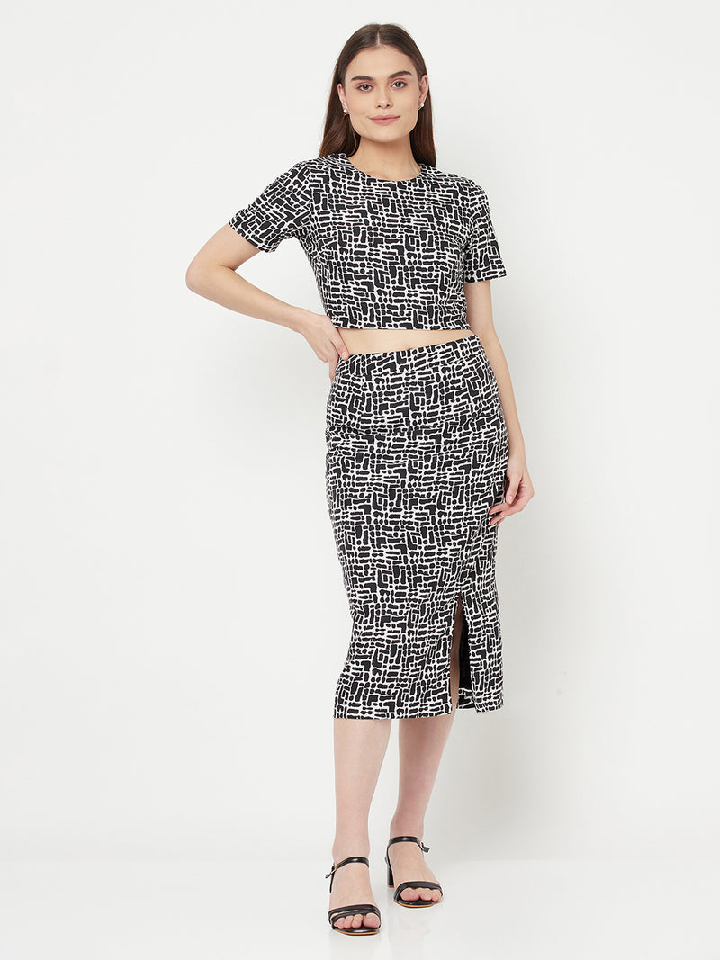 Black Printed Women Wear Co-ordinate set  includes blouson Top and a straight skirt suitable for casual and formal occasions.