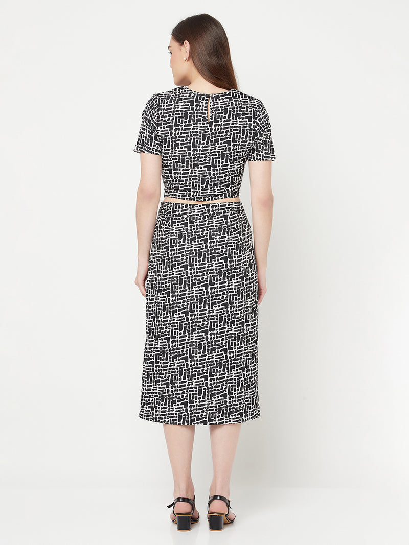 Black Printed Women Wear Co-ordinate set includes blouson Top and a straight skirt suitable for casual and formal occasions.