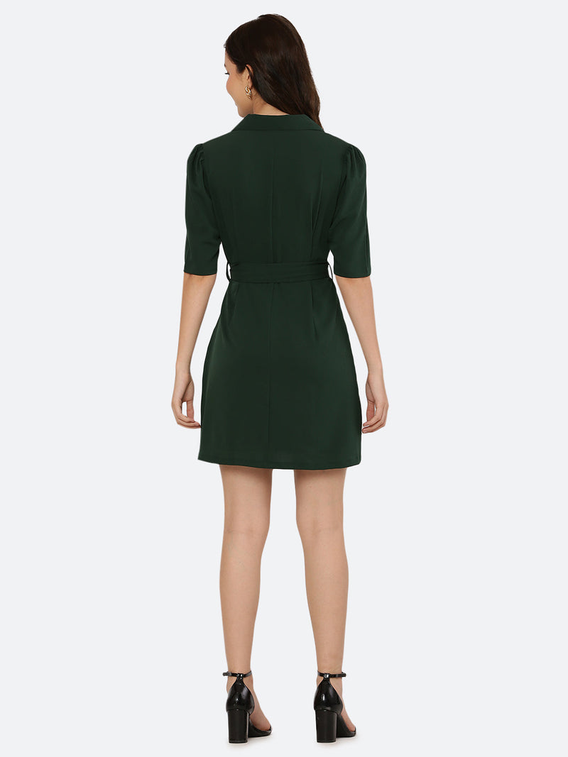 This short dress is the perfect combination of sophistication and style. The tailored collar adds a touch of elegance while the belt cinches in at the waist to create a flattering silhouette. The solid color makes it versatile and easy to pair with various accessories. Wear it to a summer barbecue or dress it up for a night out on the town. This dress is a must-have for any fashionista's wardrobe.
