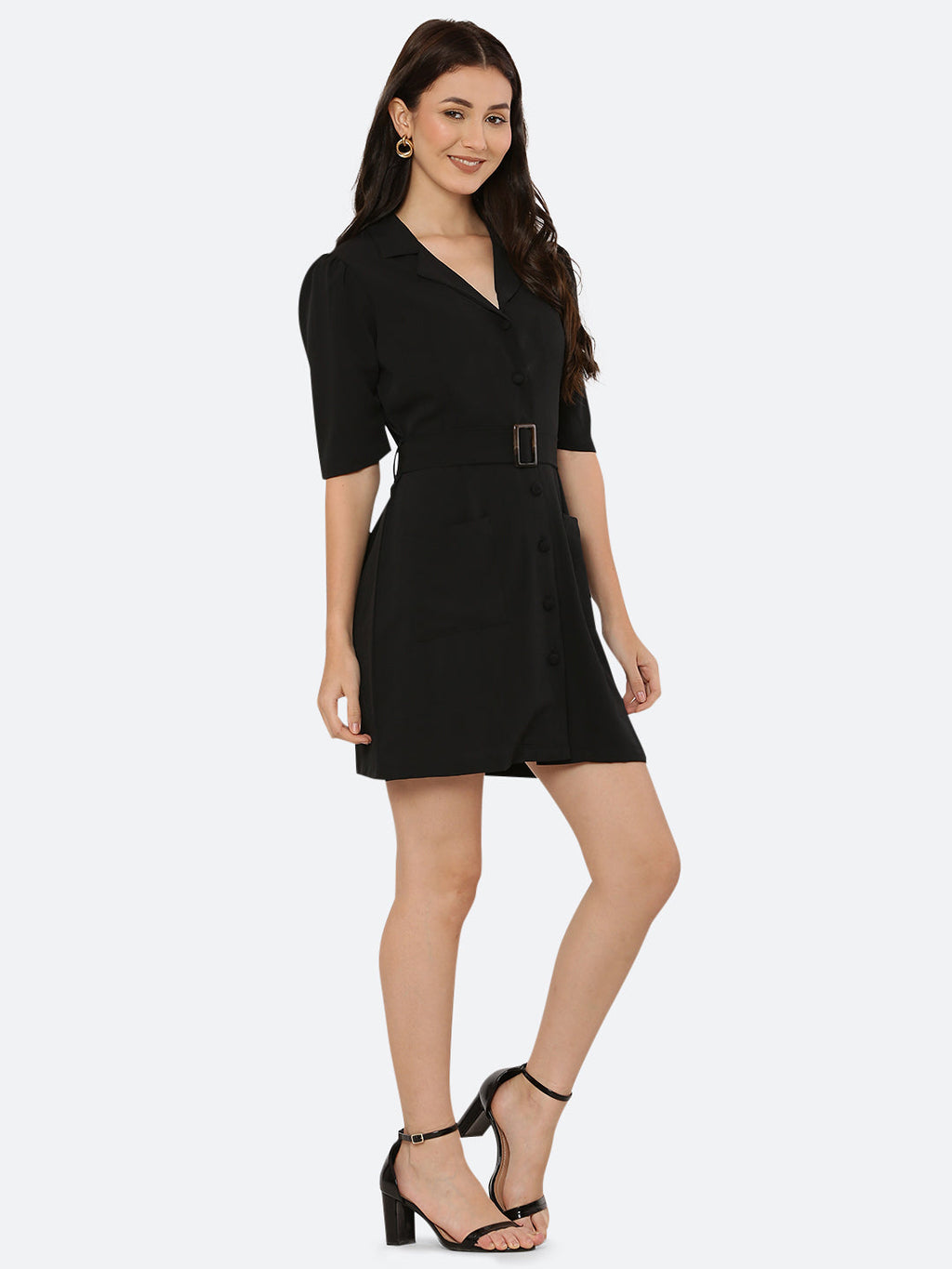 This short dress is the perfect combination of sophistication and style. The tailored collar adds a touch of elegance while the belt cinches in at the waist to create a flattering silhouette. The solid color makes it versatile and easy to pair with various accessories. Wear it to a summer barbecue or dress it up for a night out on the town. This dress is a must-have for any fashionista's wardrobe.