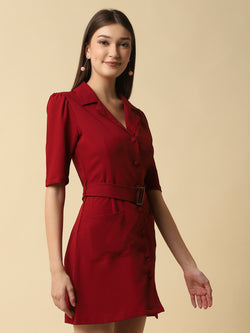 This short dress is the perfect combination of sophistication and style. The tailored collar adds a touch of elegance while the belt cinches in at the waist to create a flattering silhouette. The solid color makes it versatile and easy to pair with various accessories. Wear it to a summer barbecue or dress it up for a night out on the town. This dress is a must-have for any fashionista's wardrobe.