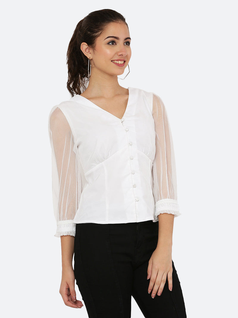 This white mesh top features a front button closure, allowing for easy wear and a stylish look. The mesh material adds a unique and trendy touch to the piece, while the soft pink color adds a feminine and playful feel.  This top can be dressed up or down, making it a versatile addition to any wardrobe. Pair it with a high waisted skirt for a chic look, or with jeans and sneakers for a more casual vibe.