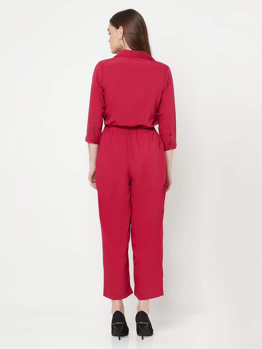 This solid jump suit for women with an elasticated waist is a versatile and stylish piece of clothing that can be dressed up or down for any occasion. It is made of a comfortable and stretchy material that allows for ease of movement, while the elasticated waistband helps to flatter the figure and create a flattering silhouette.