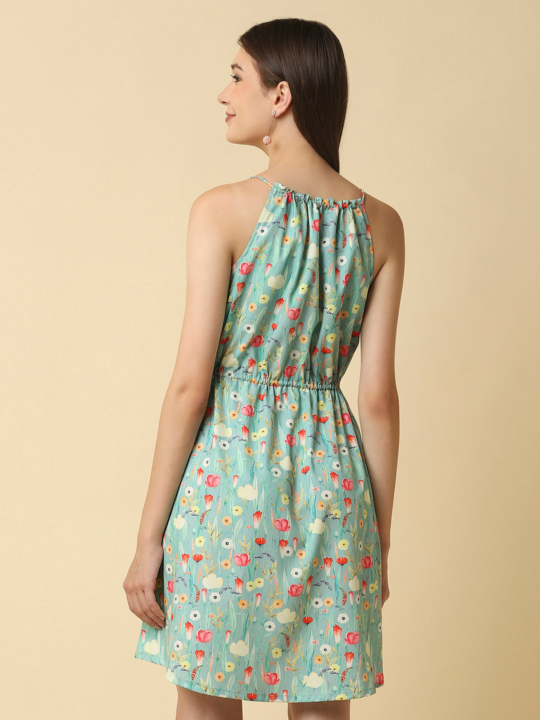 A floral printed halter neck dress with a drawstring waist and side pockets sounds like a stylish and comfortable summer dress. The halter neck style allows for a bit of skin to be shown and the drawstring waist allows for a flattering, adjustable fit. The side pockets add a practical touch and convenience, allowing you to keep small essentials close at hand. 
