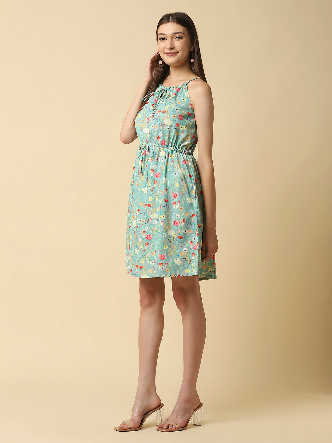 A floral printed halter neck dress with a drawstring waist and side pockets sounds like a stylish and comfortable summer dress. The halter neck style allows for a bit of skin to be shown and the drawstring waist allows for a flattering, adjustable fit. The side pockets add a practical touch and convenience, allowing you to keep small essentials close at hand. 