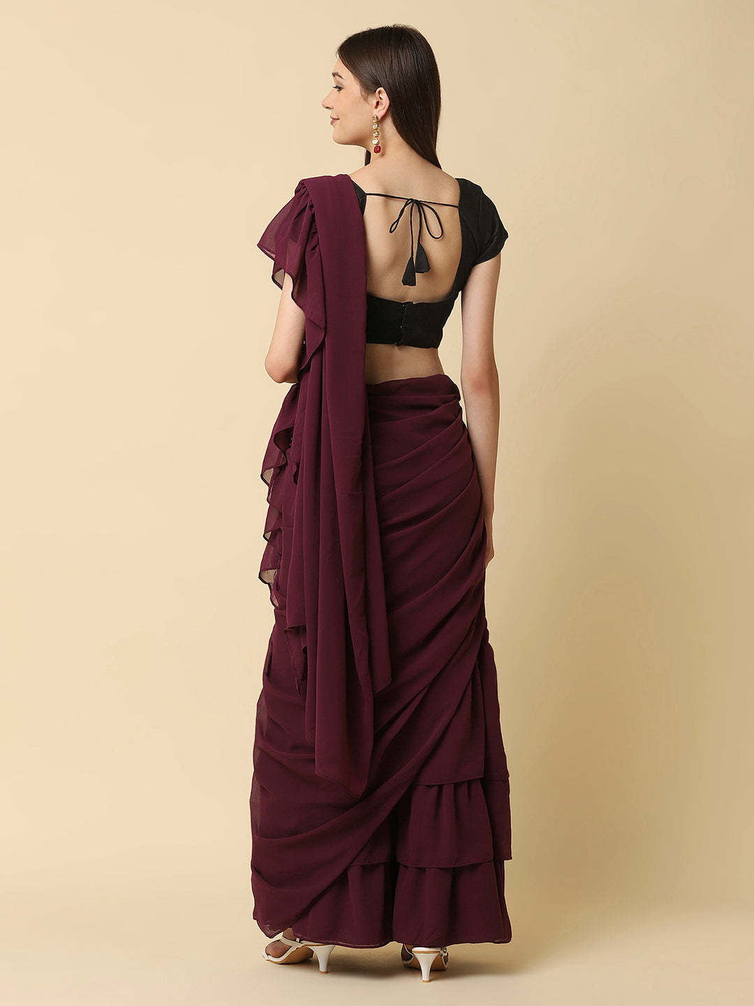 A ready-to-wear saree skirt, also known as a pre-stitched saree or a saree gown, is a modern take on the traditional Indian attire - the saree. The concept of a ready-to-wear saree skirt was introduced to make it easier for women to drape a saree without going through the hassle of pleating and tucking.