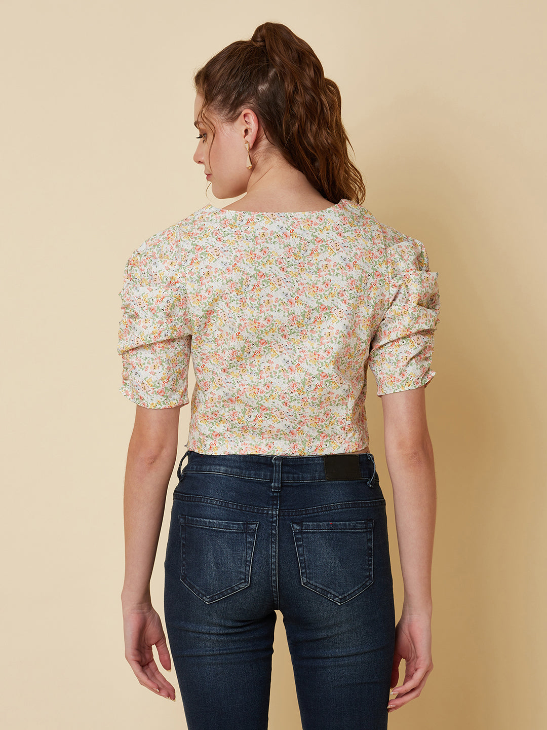 This Cotton Printed crop top for women is a versatile pieces of clothing that can be dressed on casual days. It can be worn with high-waisted skirts, shorts, or pants for a trendy and fashionable look.  Material -100% Cotton  Short and Pleated Sleeve  Zip Closure at Side  All over Floral Print