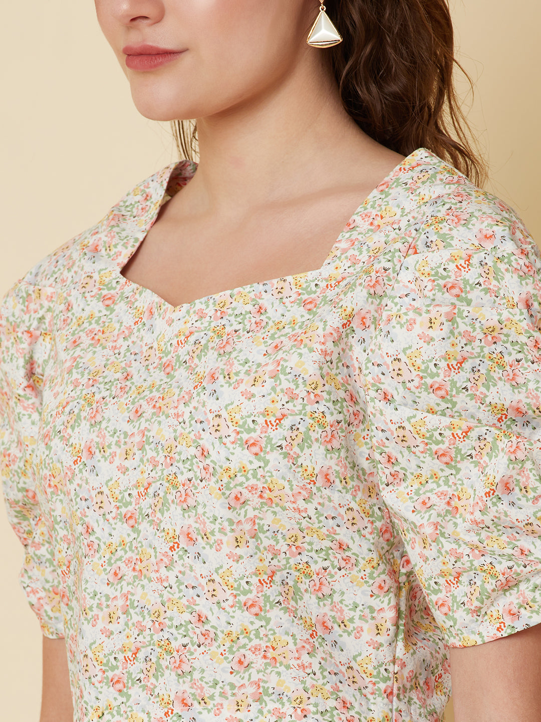 This Cotton Printed crop top for women is a versatile pieces of clothing that can be dressed on casual days. It can be worn with high-waisted skirts, shorts, or pants for a trendy and fashionable look.  Material -100% Cotton  Short and Pleated Sleeve  Zip Closure at Side  All over Floral Print
