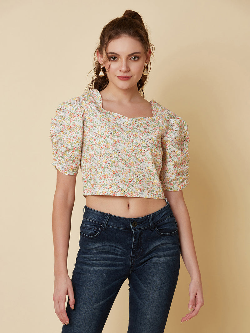 This Cotton Printed crop top for women is a versatile pieces of clothing that can be dressed on casual days. It can be worn with high-waisted skirts, shorts, or pants for a trendy and fashionable look.  Material -100% Cotton  Short and Pleated Sleeve  Zip Closure at Side  All over Floral Print