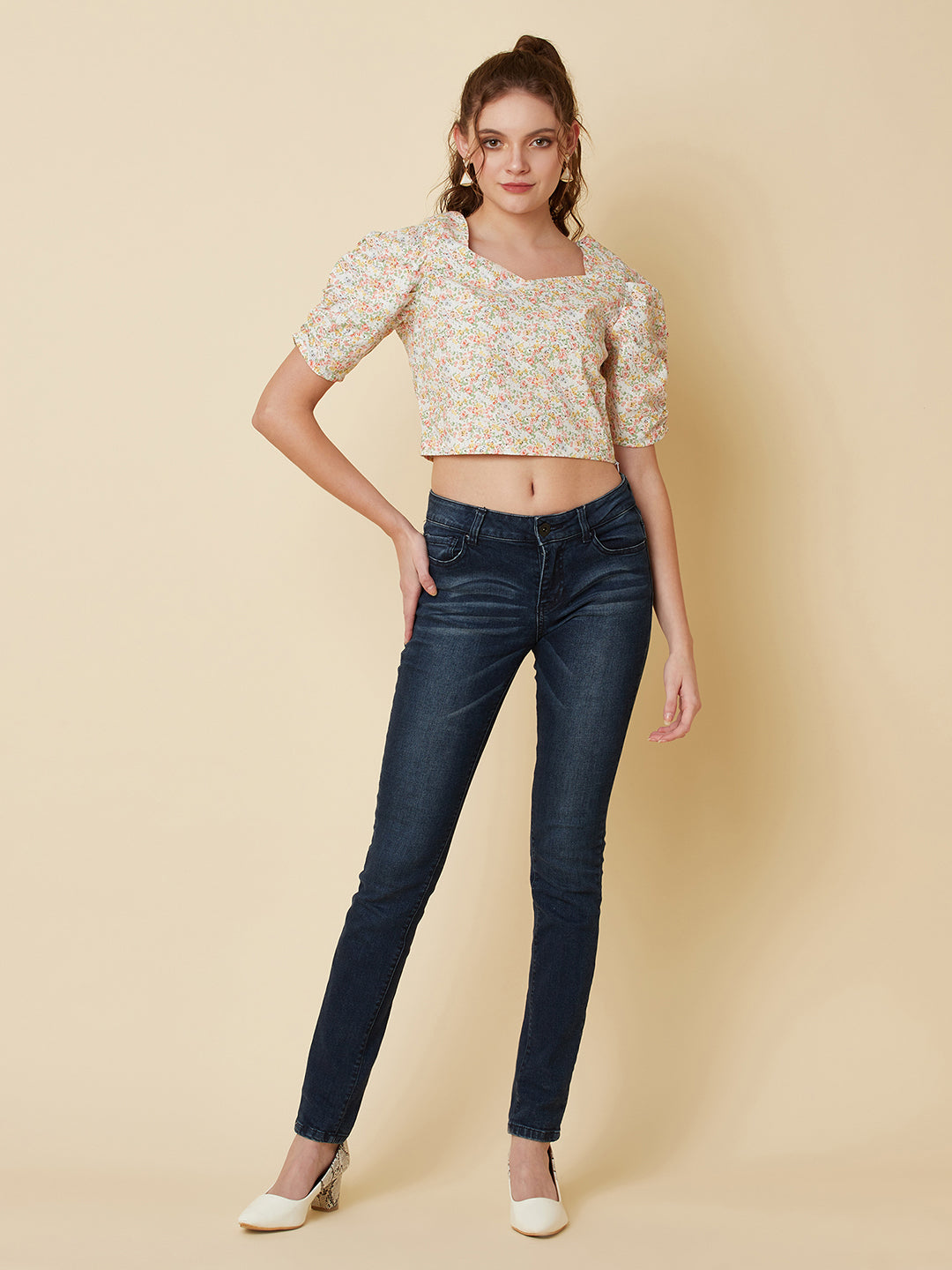 This Cotton Printed crop top for women is a versatile pieces of clothing that can be dressed on casual days. It can be worn with high-waisted skirts, shorts, or pants for a trendy and fashionable look.  Material -100% Cotton  Short and Pleated Sleeve  Zip Closure at Side  All over Floral Print