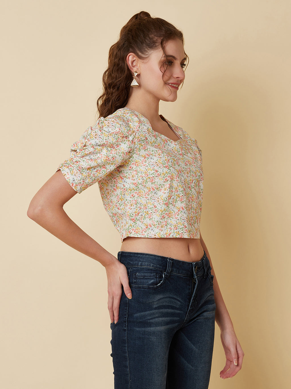 This Cotton Printed crop top for women is a versatile pieces of clothing that can be dressed on casual days. It can be worn with high-waisted skirts, shorts, or pants for a trendy and fashionable look.  Material -100% Cotton  Short and Pleated Sleeve  Zip Closure at Side  All over Floral Print