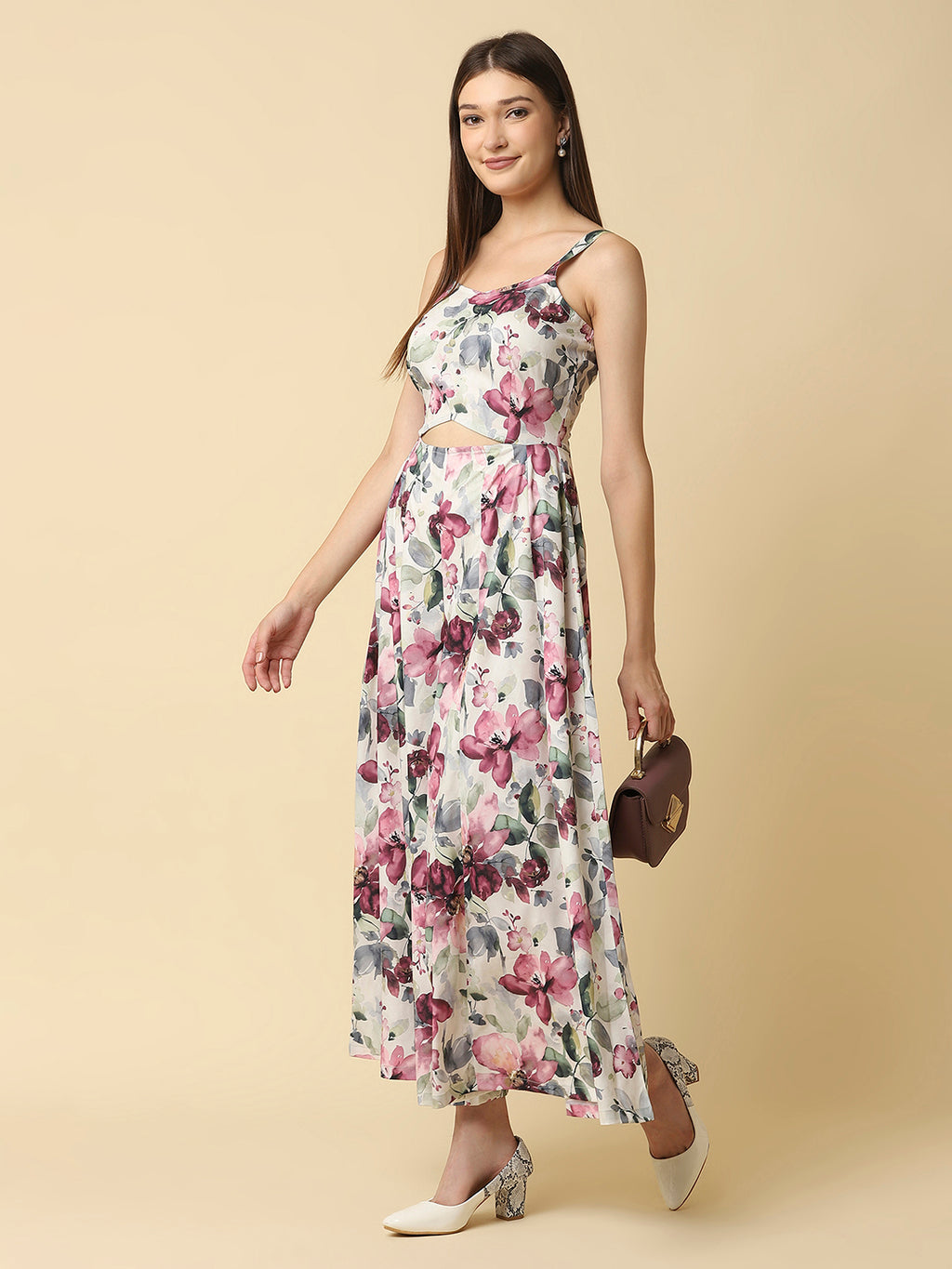 A fit and flare women floral jumpsuit with a waist cut is a stylish and trendy outfit that features a fitted bodice and a flared bottom. The waist cut creates a defined waistline, highlighting the curves of the body.