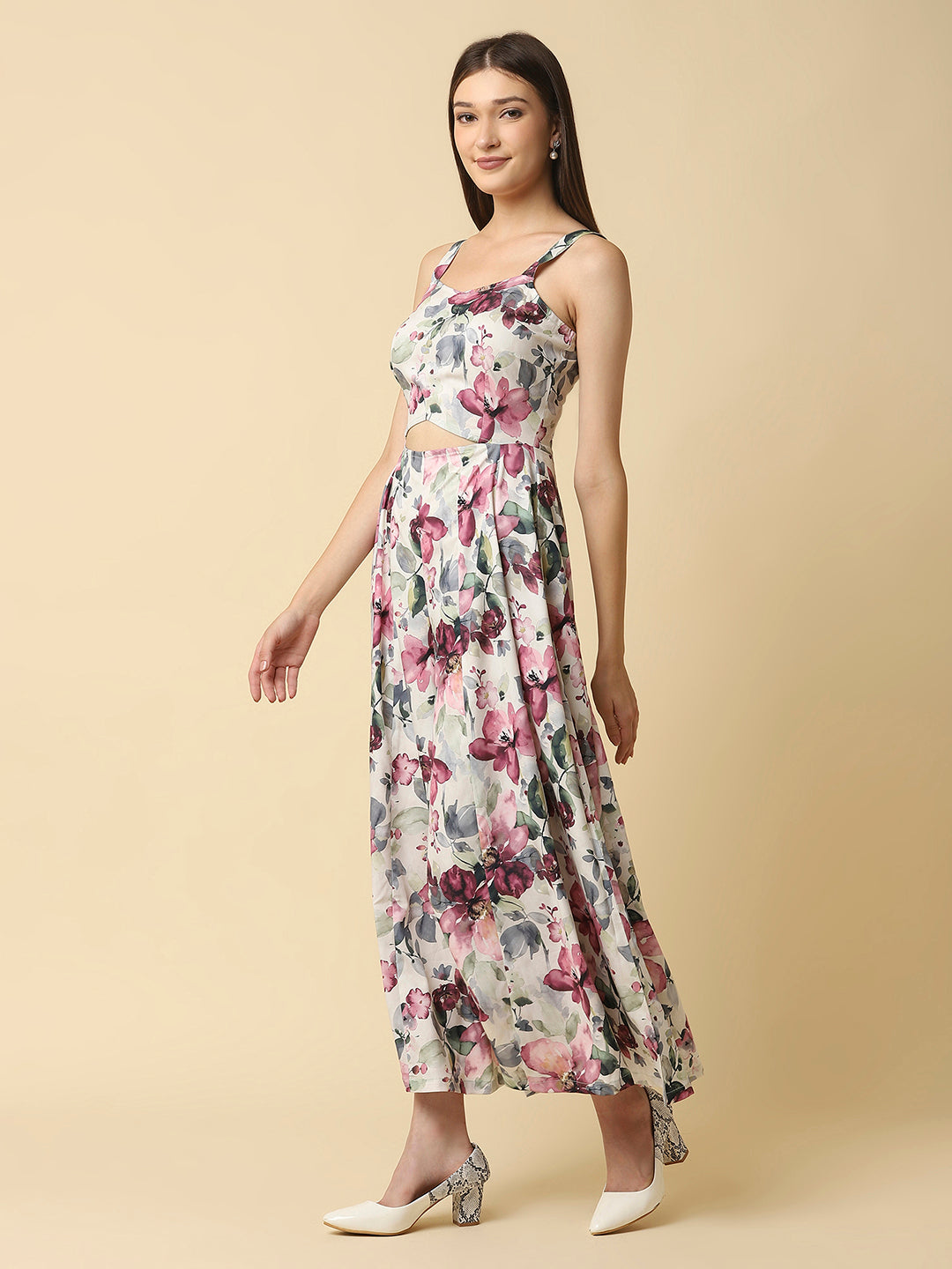 A fit and flare women floral jumpsuit with a waist cut is a stylish and trendy outfit that features a fitted bodice and a flared bottom. The waist cut creates a defined waistline, highlighting the curves of the body.