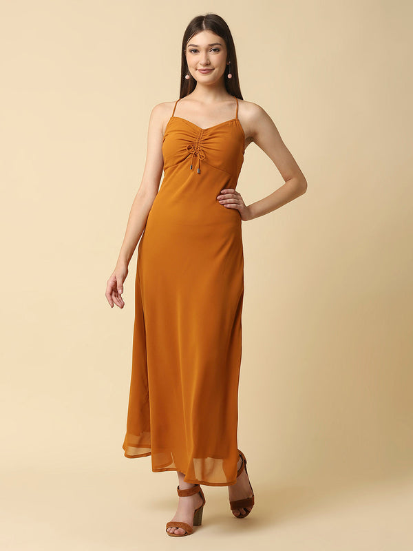 This solid maxi dress features a ruched bust and noodle straps, making it a perfect summer staple. The ruched bust adds a touch of femininity and the noodle straps ensure a comfortable fit. The maxi length makes it great for formal or casual occasions.