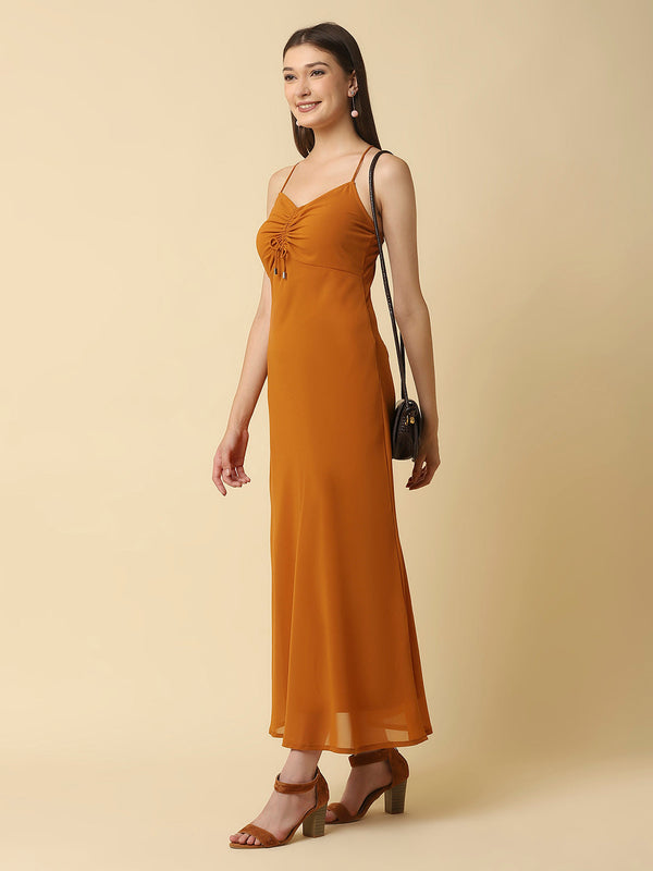 This solid maxi dress features a ruched bust and noodle straps, making it a perfect summer staple. The ruched bust adds a touch of femininity and the noodle straps ensure a comfortable fit. The maxi length makes it great for formal or casual occasions.