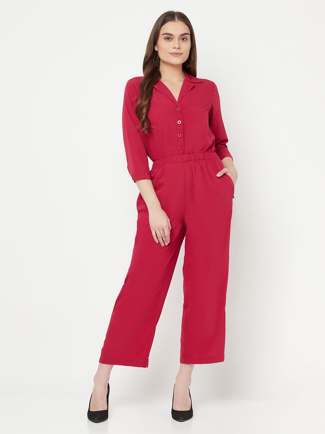 This solid jump suit for women with an elasticated waist is a versatile and stylish piece of clothing that can be dressed up or down for any occasion. It is made of a comfortable and stretchy material that allows for ease of movement, while the elasticated waistband helps to flatter the figure and create a flattering silhouette.