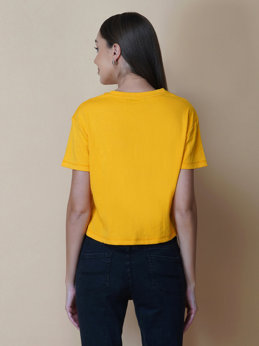This women's t-shirt features a vibrant yellow color, making it perfect for adding a pop of brightness to any outfit. The T-shirt is made from a soft, comfortable fabric that is perfect for everyday wear. The design features a classic round neckline and short sleeves, making it ideal for warmer weather.
