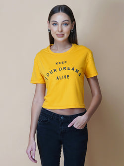 This women's t-shirt features a vibrant yellow color, making it perfect for adding a pop of brightness to any outfit. The T-shirt is made from a soft, comfortable fabric that is perfect for everyday wear. The design features a classic round neckline and short sleeves, making it ideal for warmer weather.