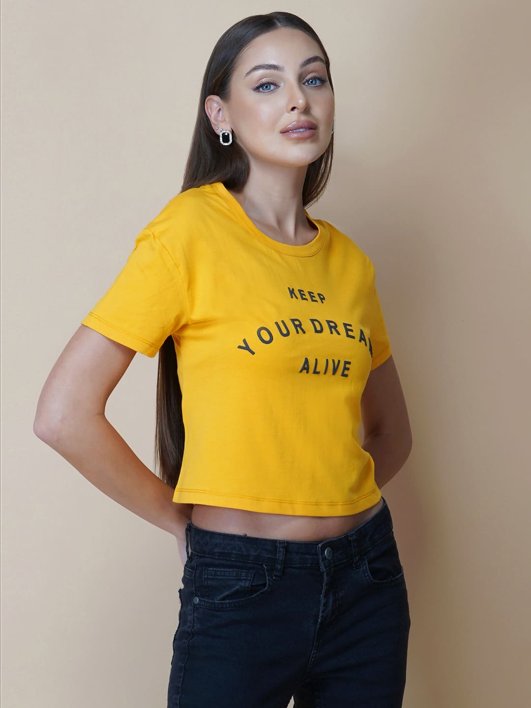 This women's t-shirt features a vibrant yellow color, making it perfect for adding a pop of brightness to any outfit. The T-shirt is made from a soft, comfortable fabric that is perfect for everyday wear. The design features a classic round neckline and short sleeves, making it ideal for warmer weather.