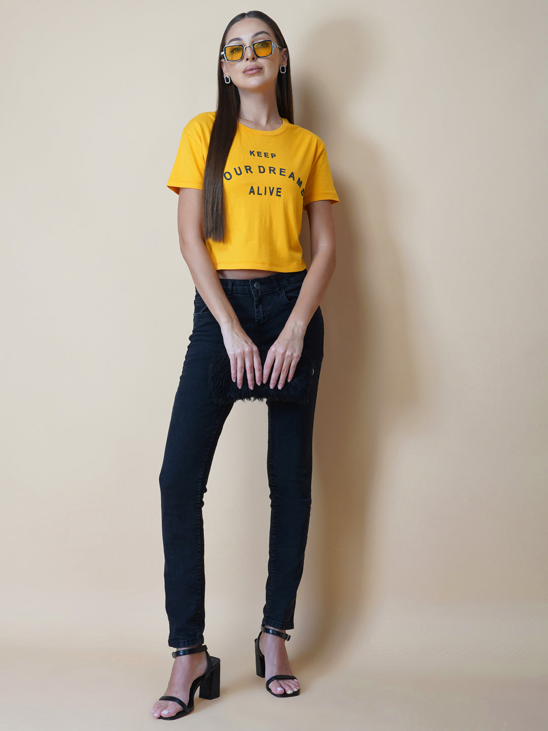 This women's t-shirt features a vibrant yellow color, making it perfect for adding a pop of brightness to any outfit. The T-shirt is made from a soft, comfortable fabric that is perfect for everyday wear. The design features a classic round neckline and short sleeves, making it ideal for warmer weather.
