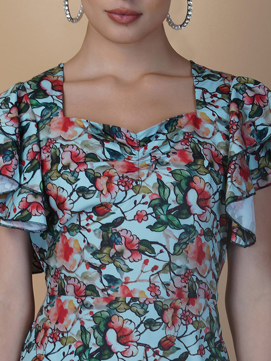 The Women Dress with Double Ruffled Sleeve and Ruched Bust is a fashionable dress for women. It features a double ruffled sleeve design that adds a feminine touch to the dress. The dress also has a ruched bust which gives it a flattering and elegant look. The dress is made from a soft and comfortable fabric that feels good against the skin.