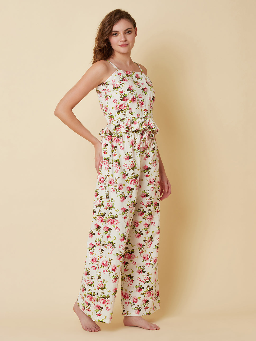 A floral printed cotton night suit for women is a comfortable and stylish sleepwear option that features a soft, breathable cotton fabric and a beautiful floral print design. This night suit for women consists of a relaxed fit style matching set of a top and bottom.  The cotton fabric used in the night suit is highly absorbent, which means it can effectively absorb sweat and keep you feeling fresh and cool throughout the night.